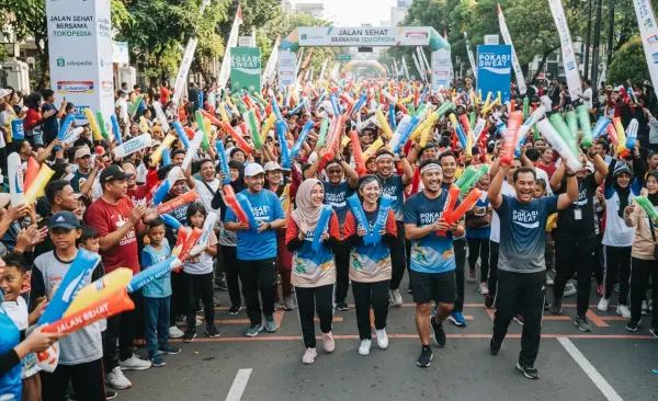 Balon Tepuk Dumai menemani keseruan acara pada event jalan sehat.