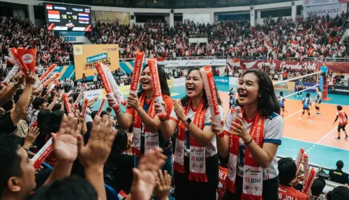 balon tepuk nganjuk turut memeriahkan pada acara pertandingan volly